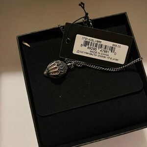 Kurt Geiger Silver Necklace with Red Wing Pendant